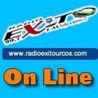 Logo de Radio Exito – 99.7 FM